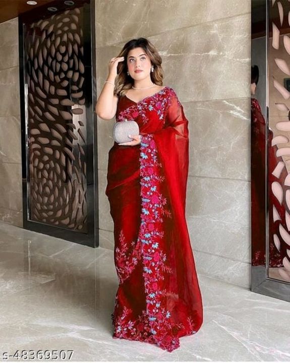 Post image * adrika attractive saari *                                          saree fabric - organza.                                                Blouse : separate blouse piece.                              Blouse fabric : Art silk.                                             Pattern : embroidered.                                             Blouse pattern : solid.                                                Multy pack : single.                                                      Saree length size : 5.5 m.                                          Blouse lenght size : 0.8 m.