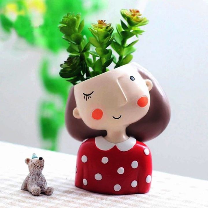 Product image with price: Rs. 62, ID: winking-girl-pot-red-5f96ff15