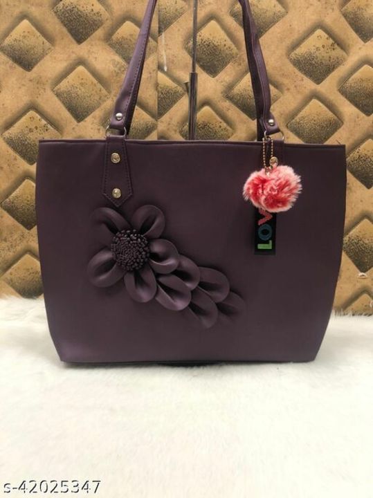 Ravishing Fashionable Women Handbags
 uploaded by business on 9/14/2021