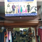 Business logo of Tailor & clothes