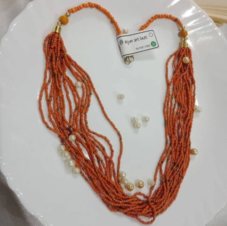 Orange beaded jewellery  uploaded by business on 9/21/2021