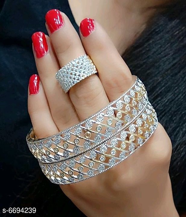 Post image American bangles set one pair
Any enquiry  msg me 
7986027125 at wholesale  prices