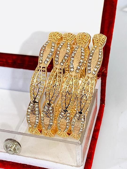 ROSE GOLD BANGLES. 
WHATSAPP .
NO COD.
EACH DIFFERENT COST.  uploaded by business on 9/15/2020