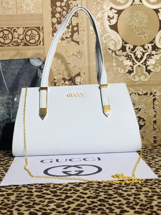 Gucci purse white solid Handbag  uploaded by business on 10/13/2021