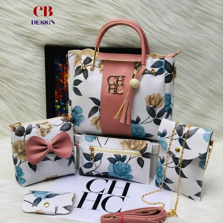 Post image - *Carolina herrera* handbag sling *5 ps combo* Flower printed 💐🌺🌼🍀 With very usefull *stylis sling* All in one combo New desingn in market 💖
Good material Awesome quality Buk now 🥰
*Price: 500 Free Shipping/-*