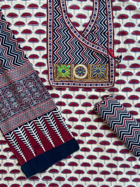Post image *Ajarakh  print Suit with hand work yoke*
*Hand aari and mirror work*

 
Pure cotton Fabric with Ajarakh print designer Salwar suit pc
Along with ajrakh print Bottom &amp; cotton  Duppatta
Available in Attractive colors and designs
 Lenght: top: 2.5 mtrBottom : 2.5 mtrDupatta: 2.5 mtr

Note: yoke of neck is ditachable. You can adjust acording to your requirement.
Please Note- Shades may slightly vary due to lights/Flash/Resolution/Display Screens/Reflection/Camera Quality.