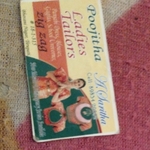 Business logo of Poojitha ladies tailor