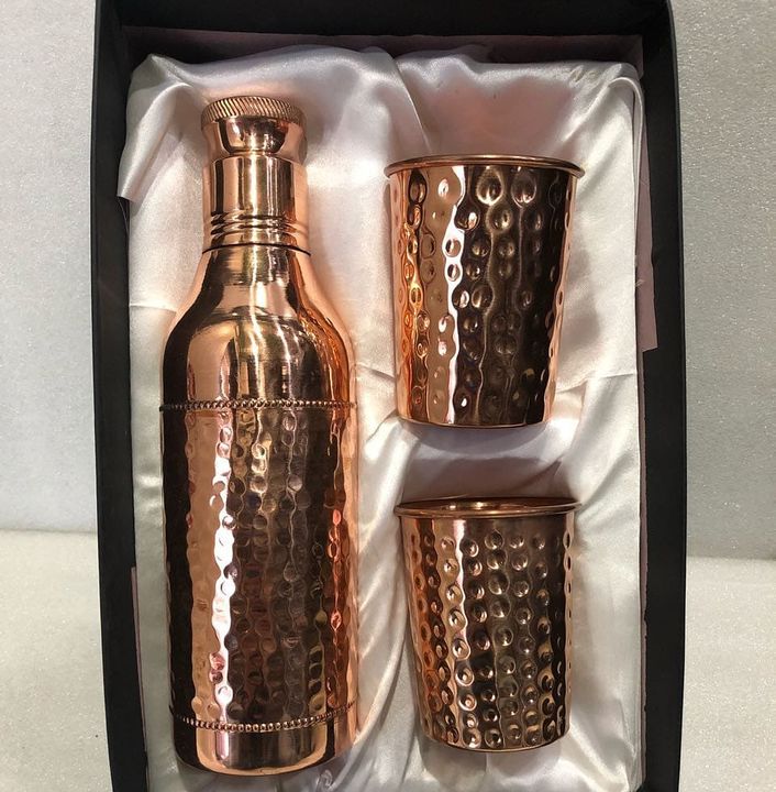 Copper champagne bottle with glass set uploaded by business on 10/16/2021