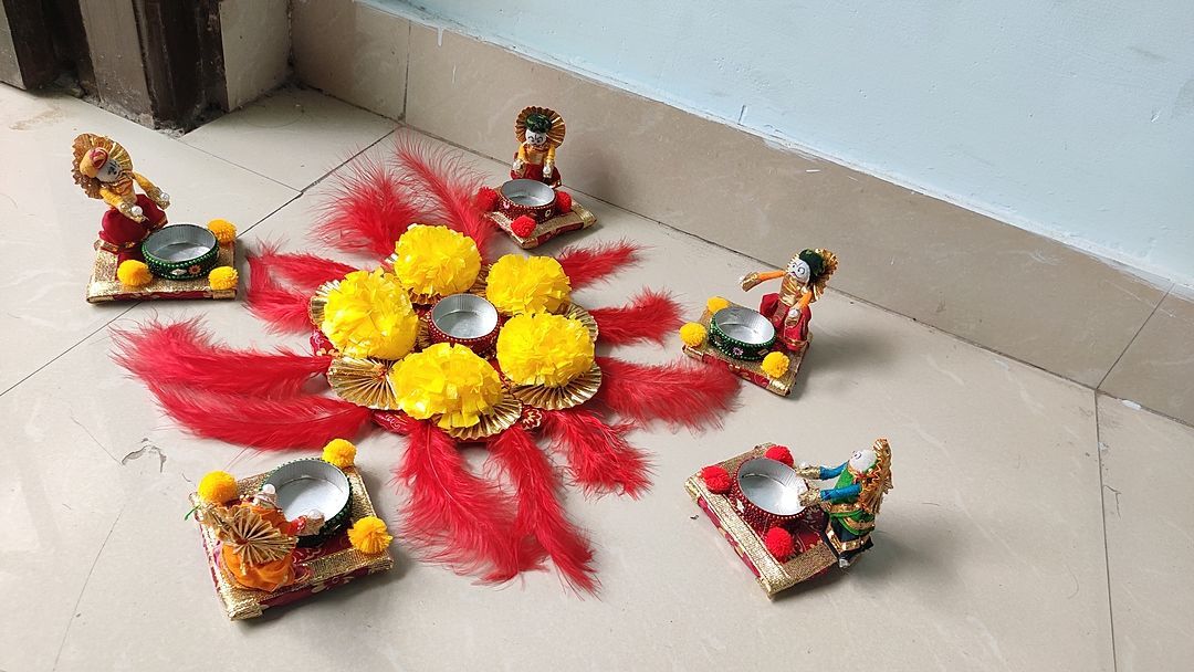 Puppet diya and flower rangoli set uploaded by Sumukh Jewels on 9/16/2020