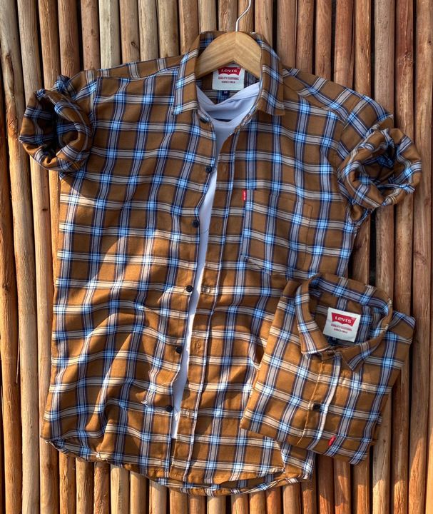 Checks shirt uploaded by business on 10/19/2021
