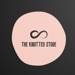 Business logo of The knotted atore