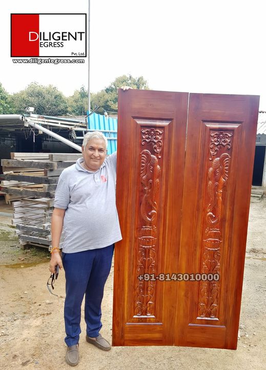 Teak wood doors uploaded by business on 10/30/2021