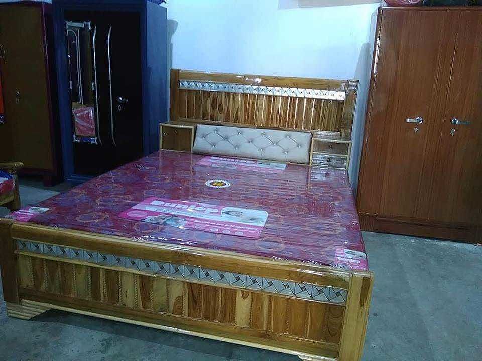 Teak wood bed uploaded by business on 9/20/2020