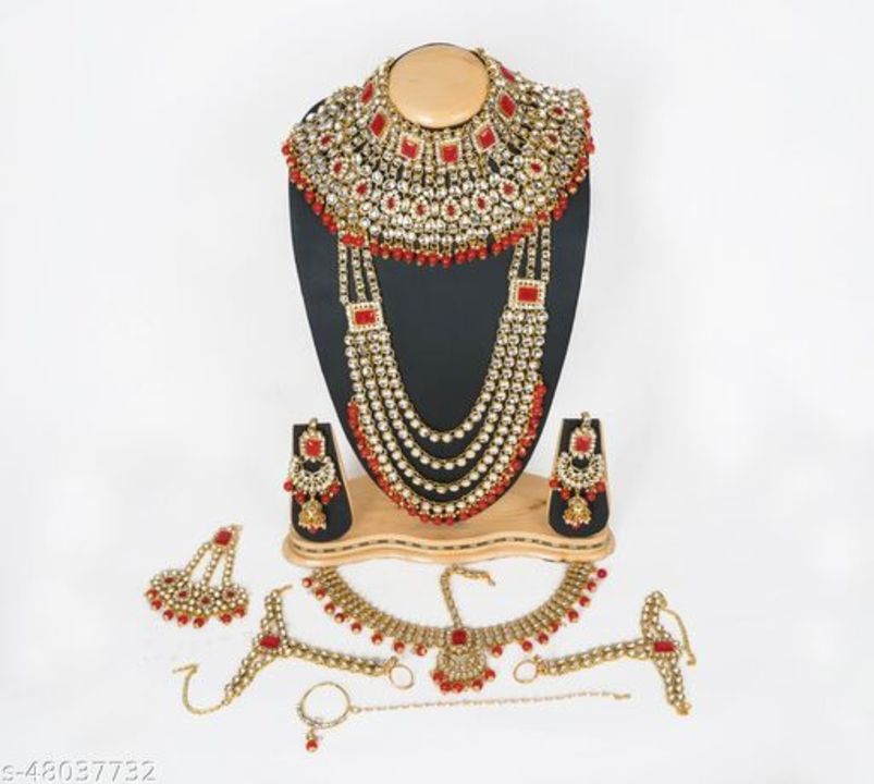 Post image Catalog Name:*Allure Chic Jewellery Sets*Base Metal: AlloyPlating: Gold PlatedStone Type: Artificial Stones &amp; BeadsType: Full Bridal SetMultipack: 1Easy Returns Available In Case Of Any Issue