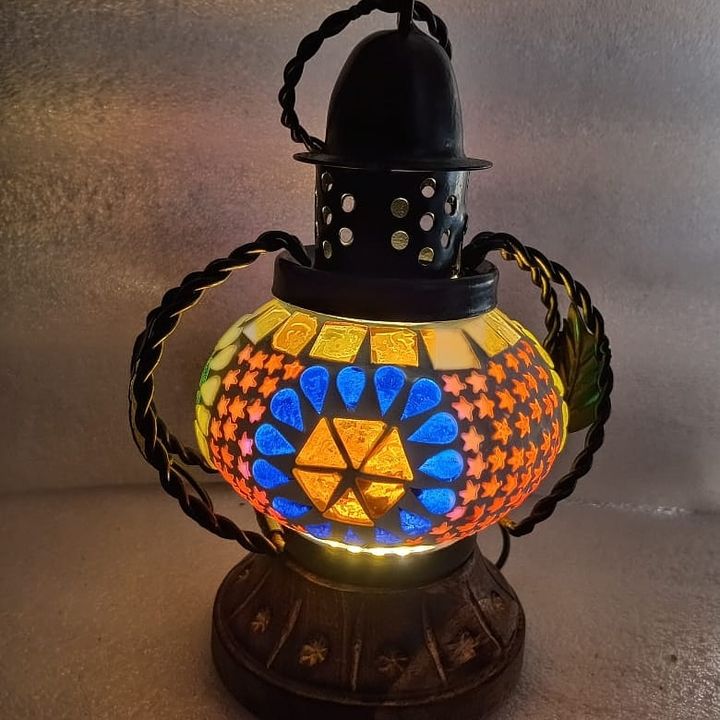 Special hand made lantern. Made in ceramic with mozaic patterns uploaded by business on 11/17/2021