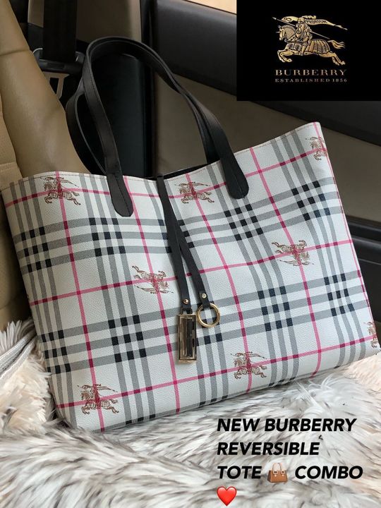 Post image *BURBERRY +GUCCI NEW 🐊 LEATHER REVERSIBLE TRAVELLING TOTE VERY DEMANDING ARTICLE NEW IN STOCK 🤩🤩*
*VERY PREMIUM QUALITY SAME AS ORIGINAL LEATHER QUALITY*🙈🙈
*DIMENSION**_HEIGHT 14 INCHES_**_WIDTH 16 INCHES_**_BASE 6 INCHES_*Dail 9556793892 to order