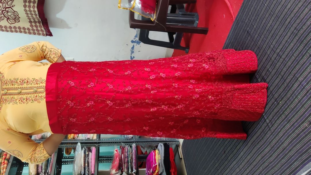 Red colour lehnga uploaded by business on 11/23/2021