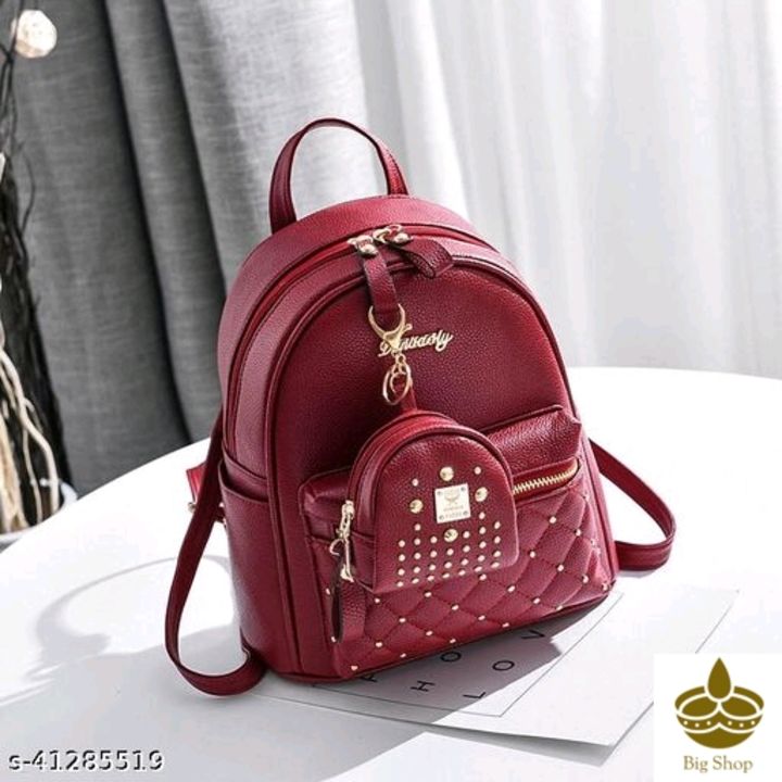 Post image Catalog Name:*Graceful Fashionable Women Backpacks*Material: PUNo. of Compartments: 2Pattern: SolidMultipack: 1Sizes:Free Size (Length Size: 11.5 in, Width Size: 14 in) 
Easy Returns Available In Case Of Any Issue*Proof of Safe Delivery! Click to know on Safety Standards of Delivery Partners- https://ltl.sh/y_nZrAV3