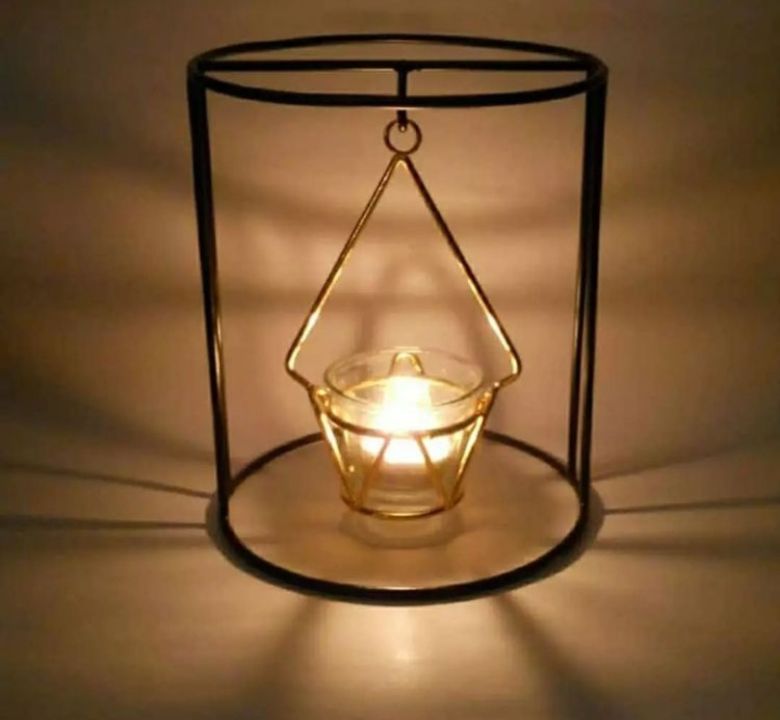 Candle holder with glass uploaded by M/S FABULOUS HANDICRAFT on 11/30/2021