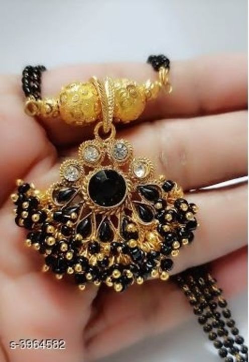 Post image Elegant Mangalsutra
Base Metal: AlloyPlating: Gold PlatedStone Type: Artificial BeadsSizing: Non-AdjustableType: Big pendant mangalsutraMultipack: 1Sizes:Free Size (Length Size: 24 in)Country of Origin: India