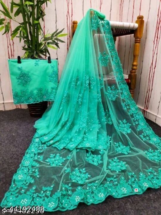 Post image Aakarsha Voguish Sarees
Saree Fabric: Net
Blouse: Running Blouse
Blouse Fabric: Net
Multipack: Single
Sizes: 
Free Size (Saree Length Size: 5.5 m, Blouse Length Size: 0.8 m) 

Country of Origin: India