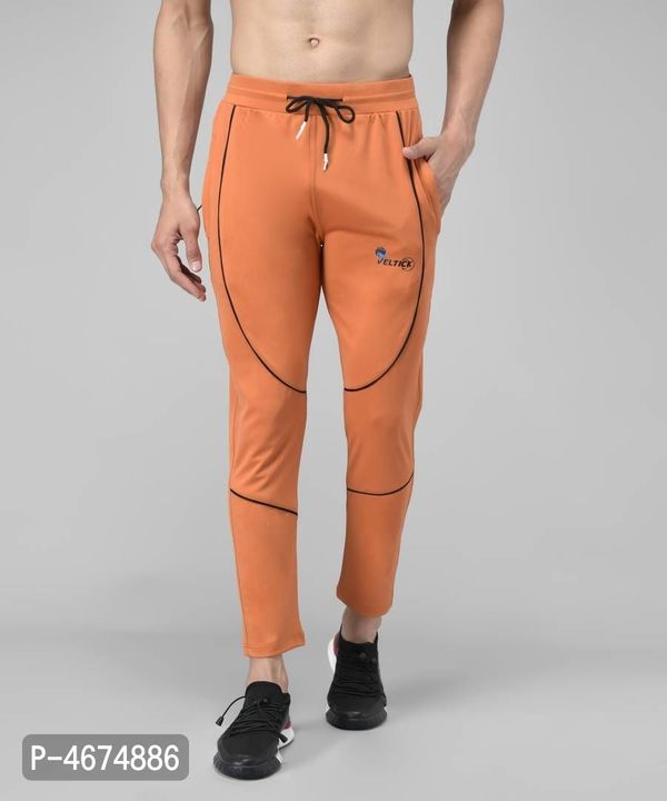 *Orange Cotton Spandex Solid Regular Fit Track Pants*

  uploaded by Shop Online Buy now Low prices🛍️💸 on 12/6/2021