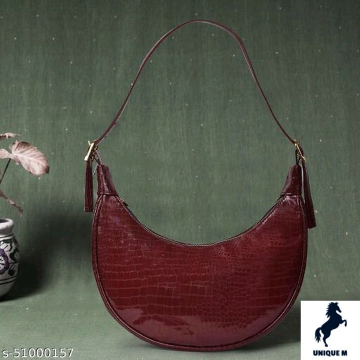 Post image Catalog Name:*Graceful Fancy Women Slingbags*Material: SyntheticNo. of Compartments: 1Pattern: SolidMultipack: 1Sizes:Free Size (Length Size: 12 in, Width Size: 10 in, Height Size: 10 in) 
Easy Returns Available In Case Of Any Issue*Proof of Safe Delivery! Click to know on Safety Standards of Delivery Partners- https://ltl.sh/y_nZrAV3