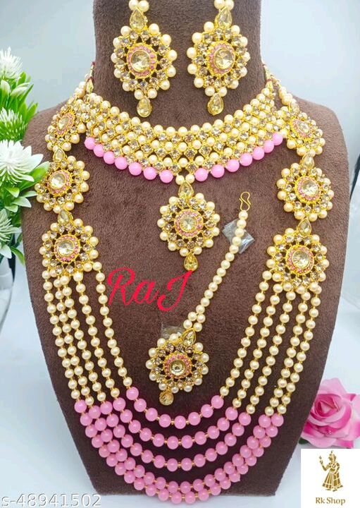 Post image Catalog Name:*Sizzling Chunky Women Necklaces &amp; Chains*Base Metal: AlloyPlating: Gold PlatedStone Type: Artificial Stones &amp; BeadsType: Haram and EarringsMultipack: 2Easy Returns Available In Case Of Any Issue*Proof of Safe Delivery! Click to know on Safety Standards of Delivery Partners- https://ltl.sh/y_nZrAV3Price 450