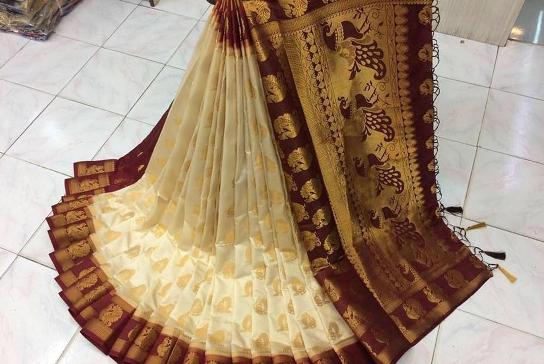 White Woven Design Art Silk Saree with Blouse Piece uploaded by SriCharani Fashion World on 12/10/2021