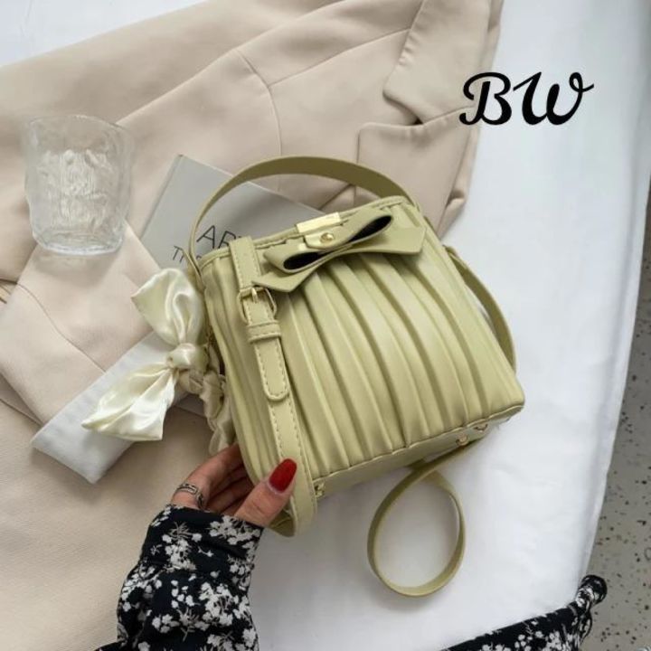 HIGH QUALITY IMPORTED HANDBAG AND SLING WID LONG BELT AND CLASSSY LOOK WID DUAL COMPARTMENT uploaded by business on 12/13/2021