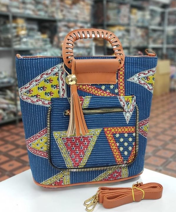 *IKKAT CUTWORK FANCY HANDLE TOTE*

➢ *Can Be Paired With Any Western & Traditional Outfit*
➢ *Perfec uploaded by Fashion plus on 12/15/2021