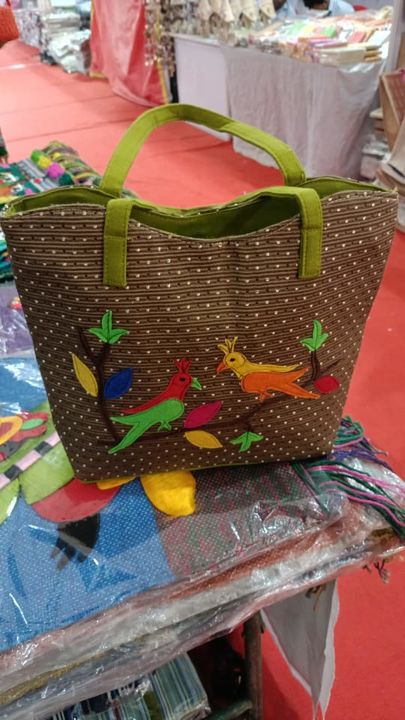 Ladies jute hand bag uploaded by business on 12/15/2021