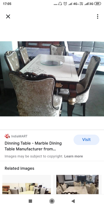 Dinning table with a glass and 6 chairs uploaded by business on 12/16/2021