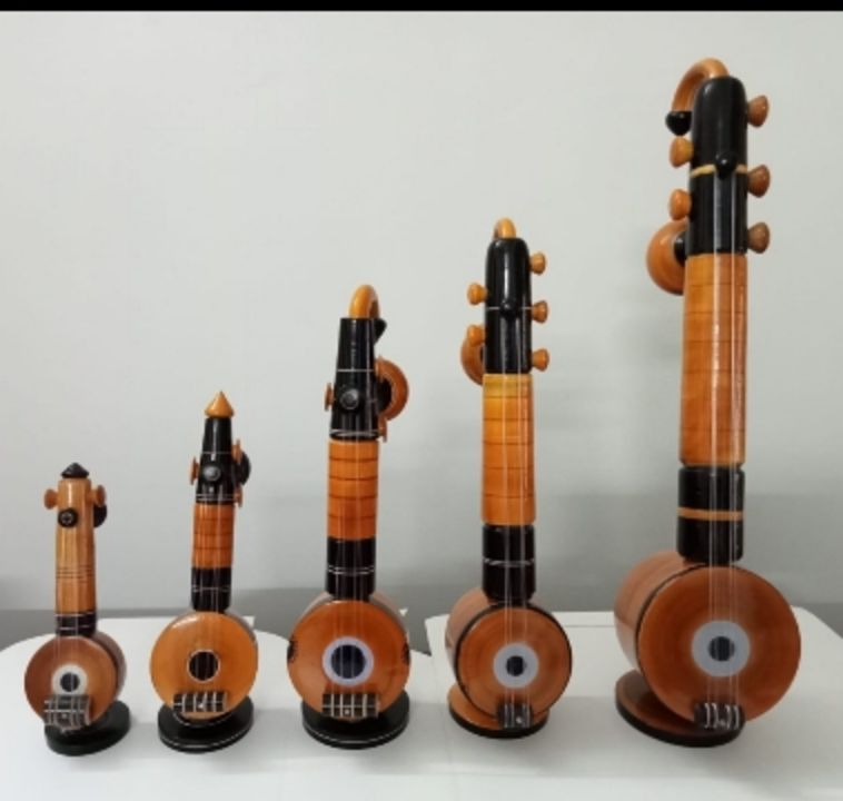 Post image We manufacture wooden toys Veena , Guitar key stand , Agarbhathi stand. It's very reasonable and finishing is very good. It's suitable for gifts and show pieces