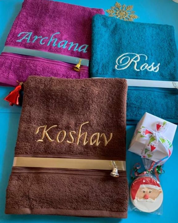 Customize towel with only name uploaded by business on 12/23/2021
