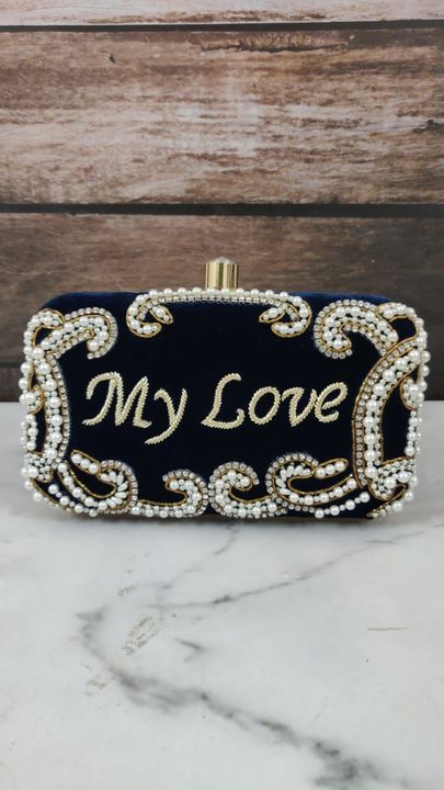 Customized name clutches uploaded by business on 12/26/2021