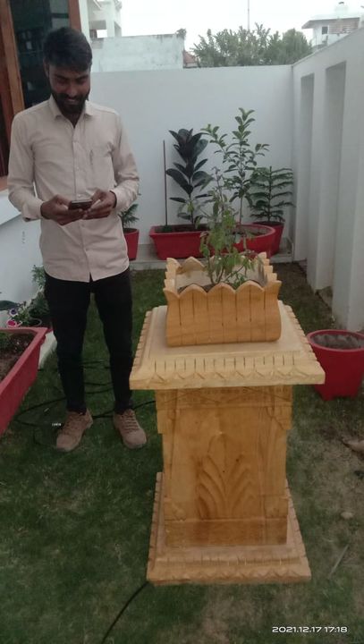 Teakwood stone tulsi pot ,hand carving uploaded by STONE FORT INDIA on 12/30/2021