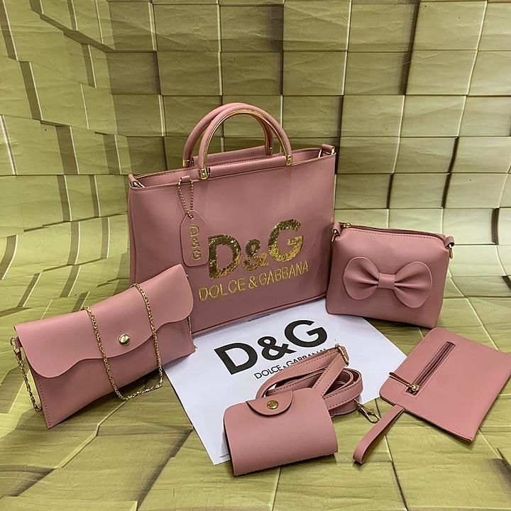 Dolce & Gabana 💫⭐️
5 pc Combo
Sequence embroidery work
Front of Bag
Handbag double zip
& inside clo uploaded by business on 9/28/2020