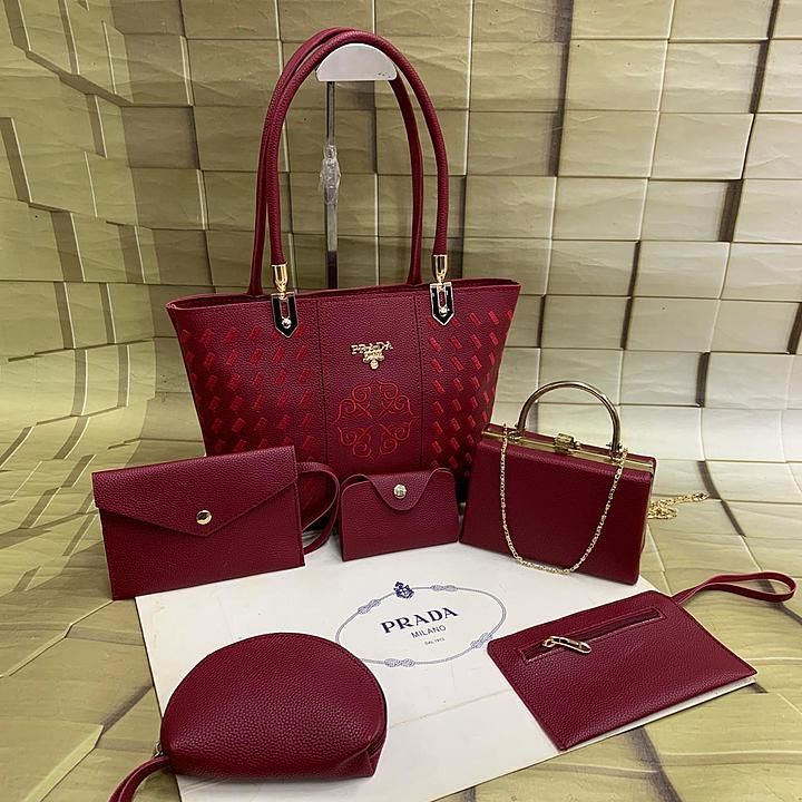 Prada combo
Back again in 6 PC set 
Handbag 👜 Pouch 👝 
Card holder 💳
Clutch 👛wallet 💴
 uploaded by business on 9/28/2020