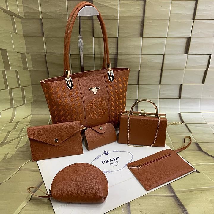 Prada combo
Back again in 6 PC set 
Handbag 👜 Pouch 👝 
Card holder 💳
Clutch 👛wallet 💴
 uploaded by A.B BAG.HOUSE on 9/28/2020