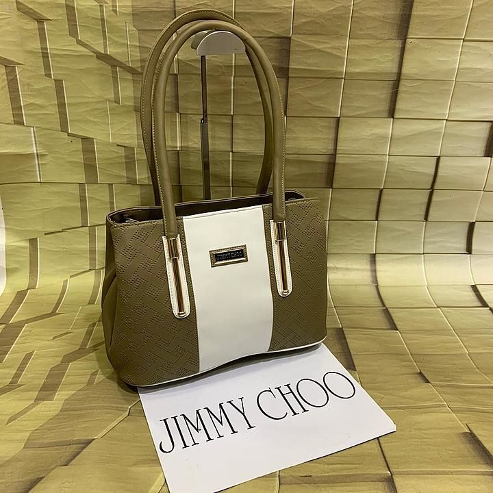 Jimmy choo handbag
👜 👜👜👜
One Zip three compartment😱😍
Ideal for office wear 

Awesome quality  uploaded by A.B BAG.HOUSE on 9/28/2020