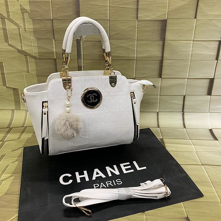 Chanel handbag 
Classy look zip model 
Broad Base bags spacious 

New model spacious bag

Available  uploaded by business on 9/28/2020