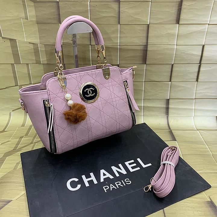 Chanel handbag 
Classy look zip model 
Broad Base bags spacious 

New model spacious bag

Available  uploaded by A.B BAG.HOUSE on 9/28/2020