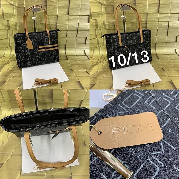 FIOM
Imported handbag 

Big spacious for office wear 

Can keep long books 📚 

Quality always best  uploaded by A.B BAG.HOUSE on 9/28/2020