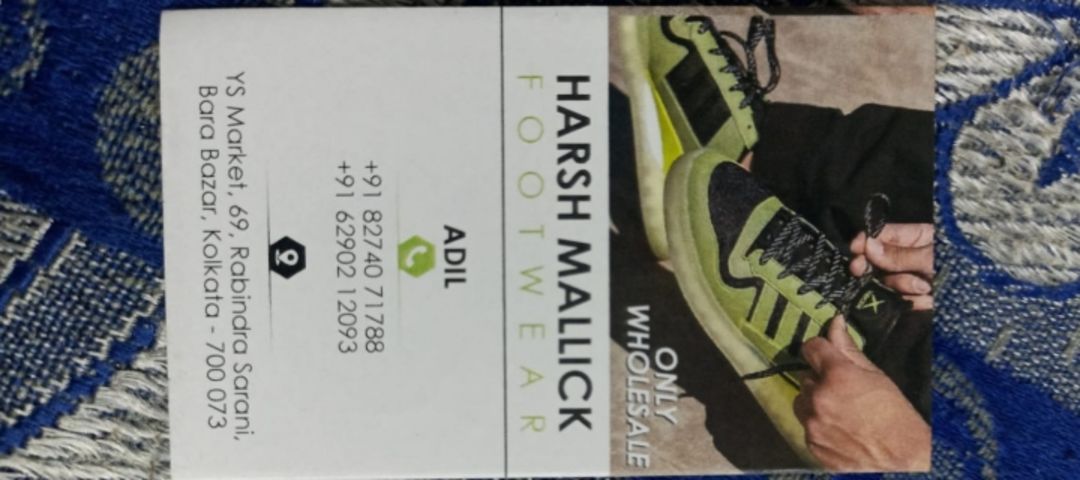 Visiting card store images of HM Footwear