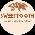 Business logo of Sweettooth Chocolates
