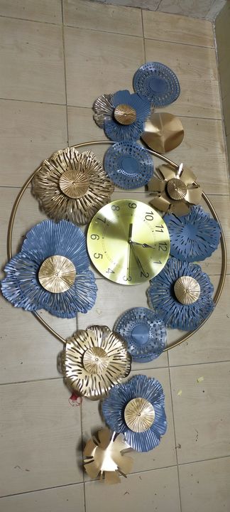 Metal wall clock uploaded by business on 1/7/2022