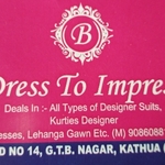 Business logo of Ladies party wear suit