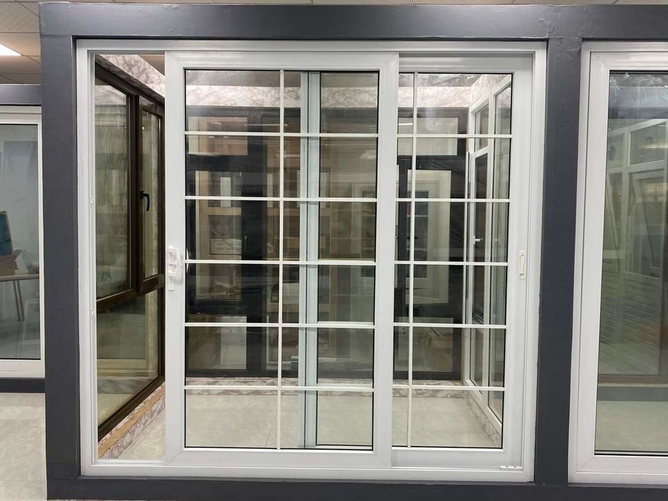 Upvc sliding window with on glass design uploaded by Sk enterprises on 1/16/2022