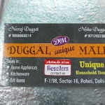 Business logo of Duggal unique mall